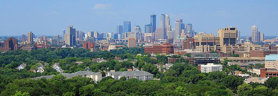 Minneapolis_skyline_from_Prospect_Park_Water_Tower_July_2014